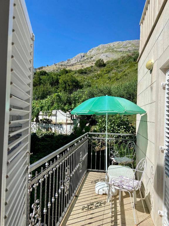 Balcony with mountain view at Rooms Villa Gala